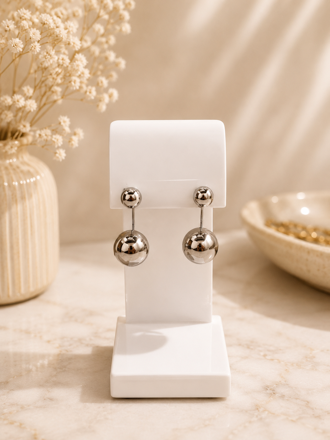 Aretes doble esfera plateada