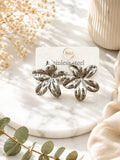 Aretes flor plateada acero inoxidable